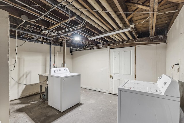 laundry room with washer and clothes dryer