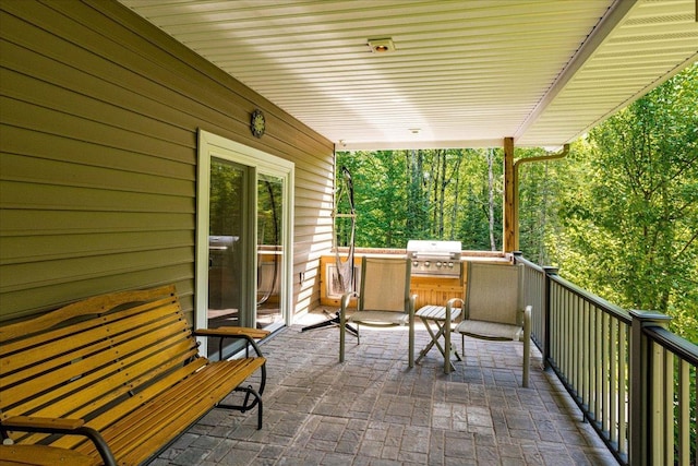 view of patio / terrace with grilling area and an outdoor kitchen