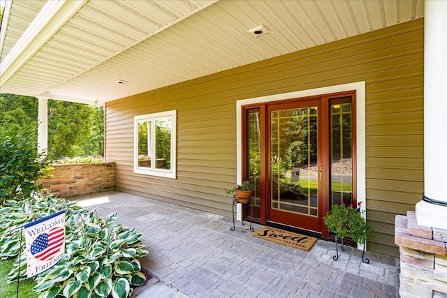 entrance to property with a porch