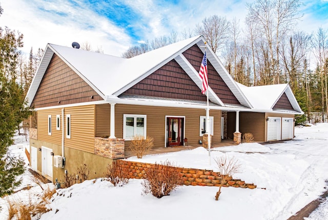 craftsman-style home featuring a garage