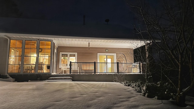 view of back house at night