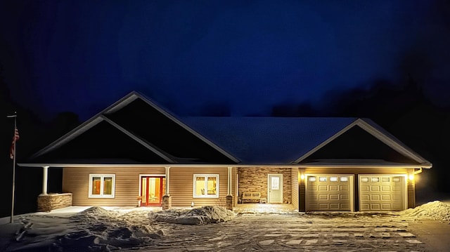 craftsman-style home featuring a garage