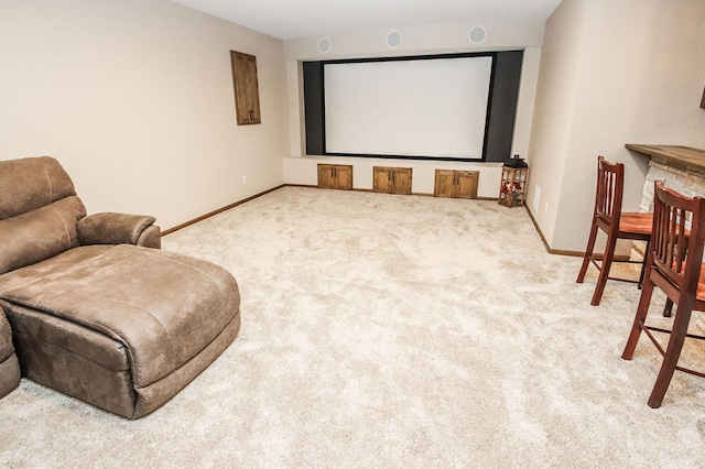 home theater featuring light carpet