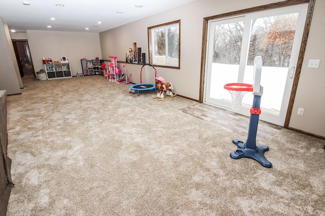 game room featuring carpet floors and plenty of natural light