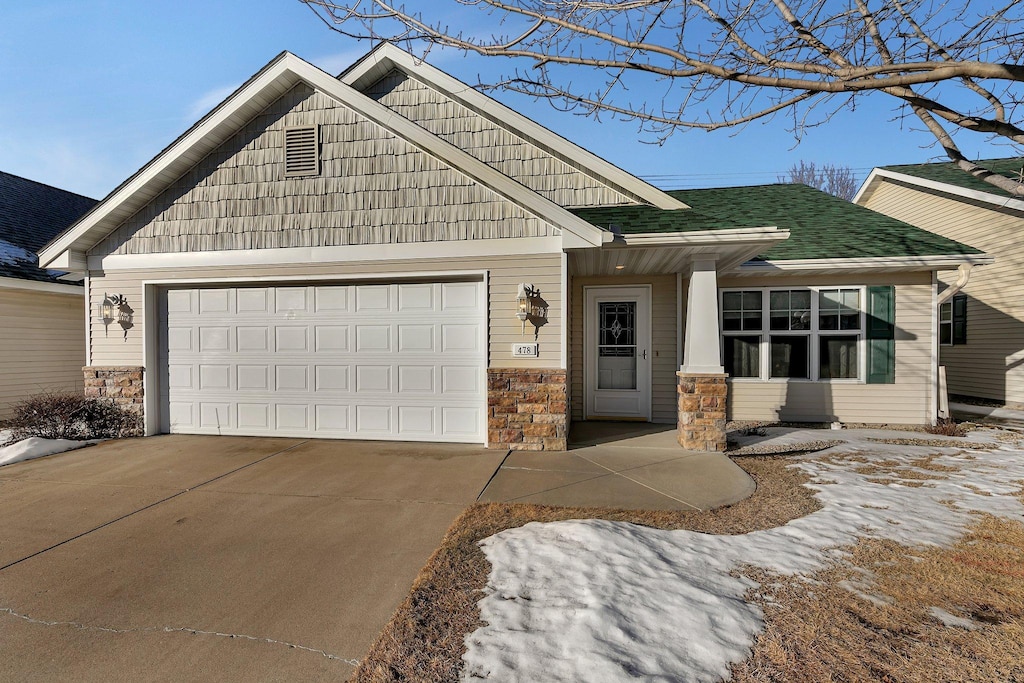 view of front of property featuring a garage