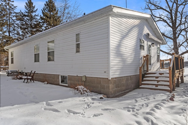 view of snow covered property