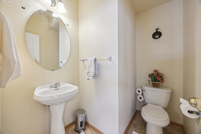 bathroom with sink and toilet