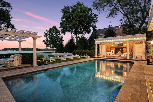 20100 Lakeview Ave, Deephaven, MN 55331 - swimming pool with a pergola, an exterior structure, and a patio area
