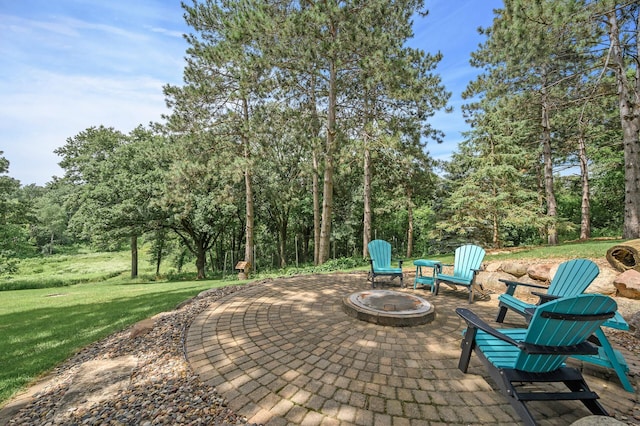 view of patio / terrace featuring a fire pit