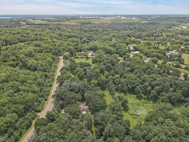 bird's eye view featuring a forest view