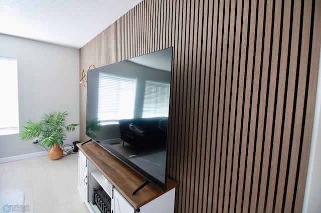 interior space with a textured ceiling