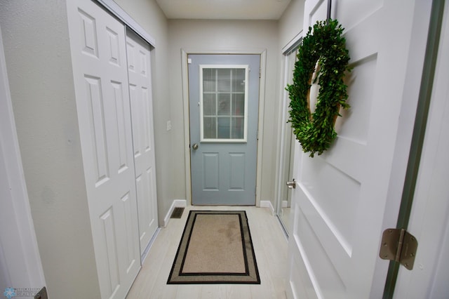 doorway featuring light hardwood / wood-style flooring