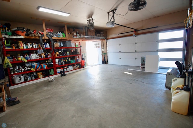 garage featuring a garage door opener