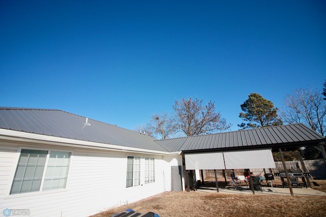 view of home's exterior with a patio