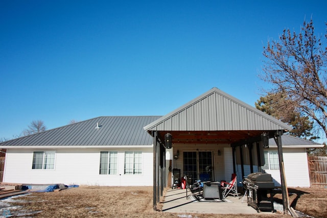 back of house featuring a patio area