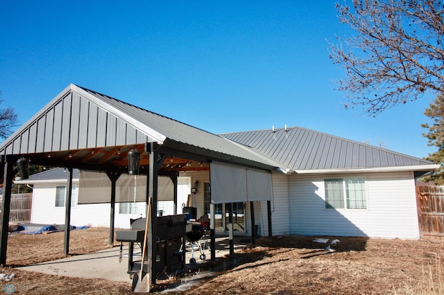 rear view of property with a patio area