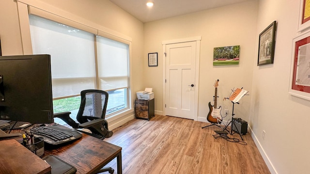 office area featuring light hardwood / wood-style floors