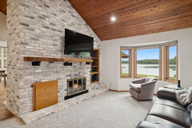 unfurnished living room featuring carpet flooring, high vaulted ceiling, a brick fireplace, and wooden ceiling