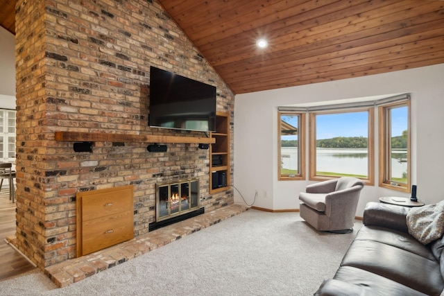 carpeted living room featuring vaulted ceiling, a brick fireplace, and wooden ceiling