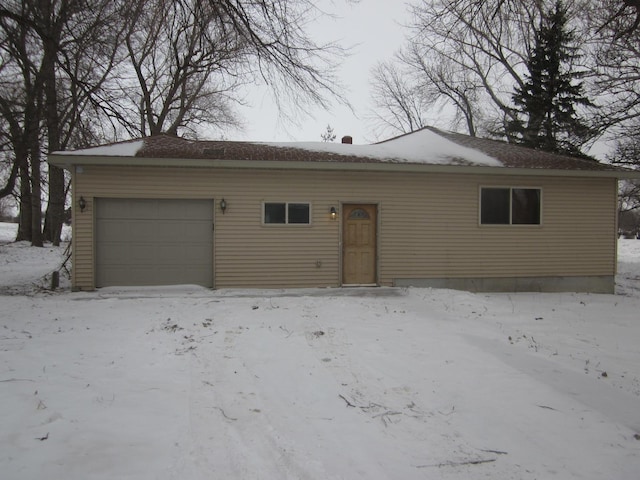 view of snow covered property