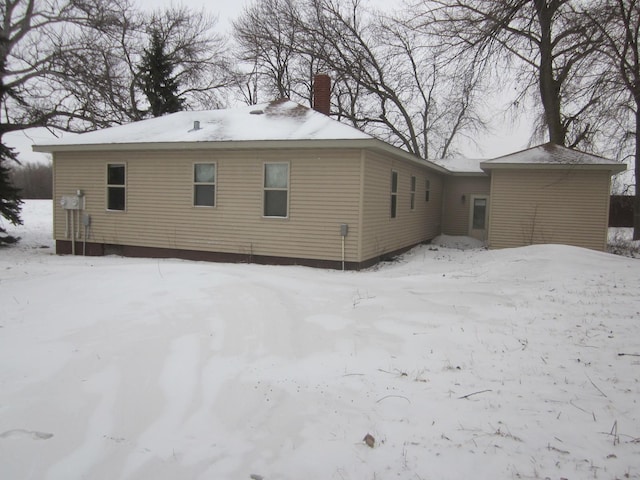 view of snow covered property