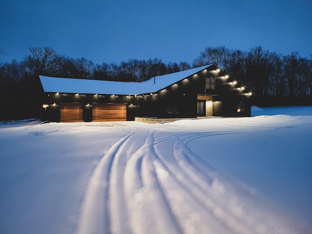 view of front of property with a garage