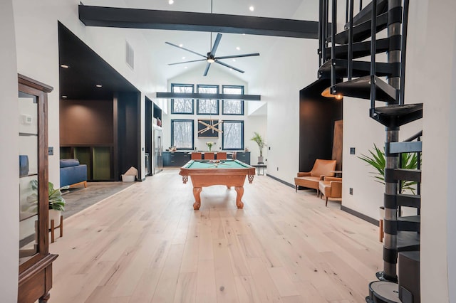 game room with beamed ceiling, high vaulted ceiling, light wood-type flooring, and billiards