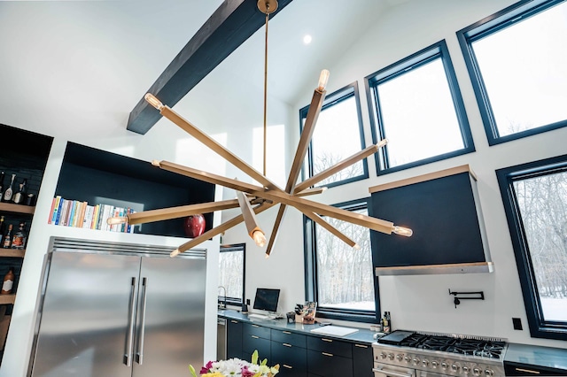 kitchen featuring high vaulted ceiling and high quality appliances