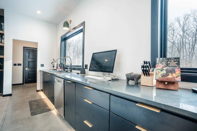 kitchen featuring dishwasher and sink