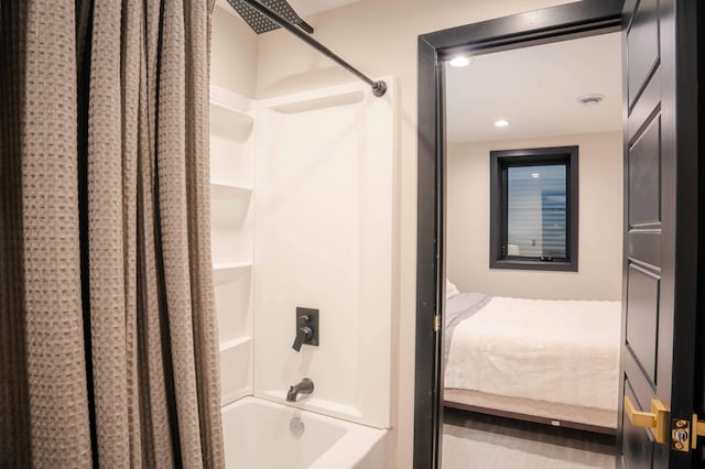 bathroom with shower / bathing tub combination