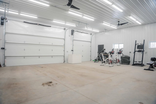 garage featuring electric panel and ceiling fan