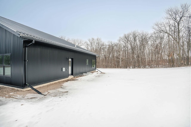 view of snow covered property