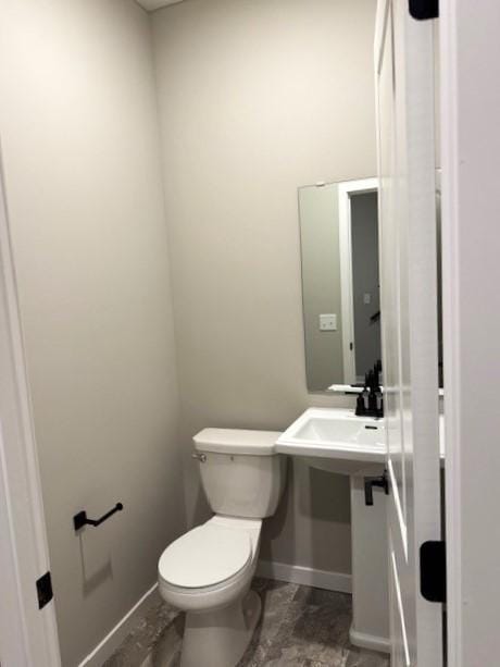 bathroom featuring toilet