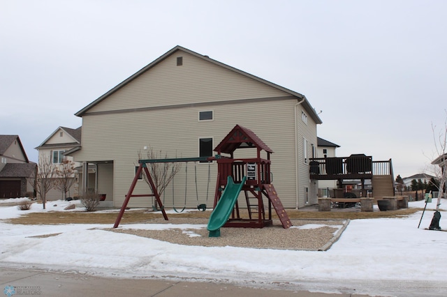 view of snow covered playground