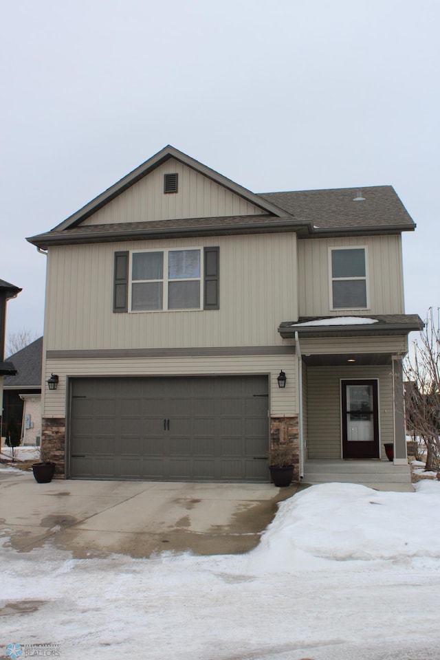 view of front of property featuring a garage