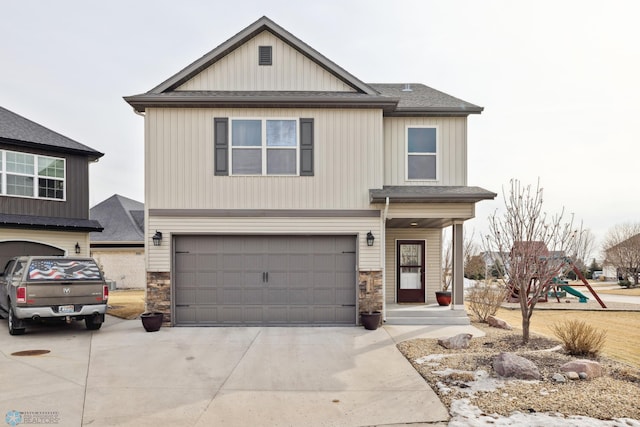 craftsman-style home with stone siding, an attached garage, concrete driveway, and a shingled roof