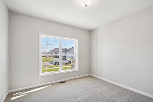 empty room with light carpet