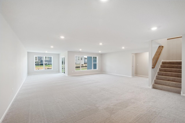 interior space featuring light colored carpet