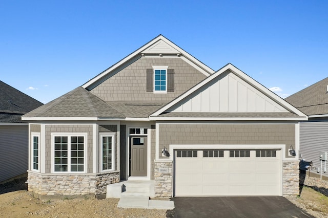 craftsman-style home with a garage