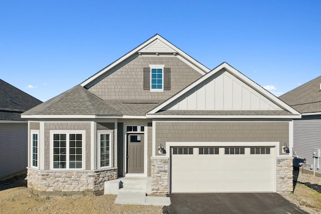 craftsman inspired home featuring a garage