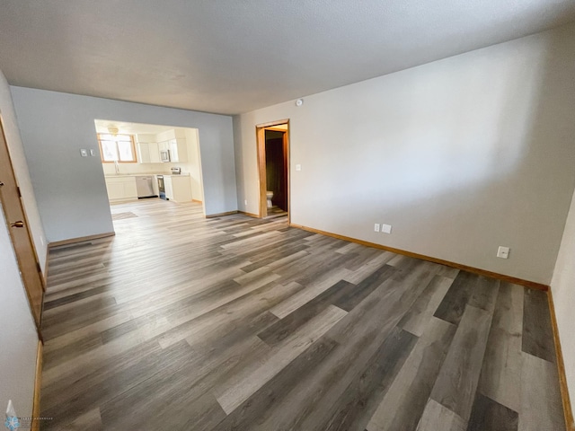 empty room with wood-type flooring