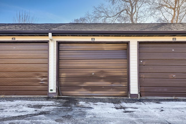 view of snow covered garage