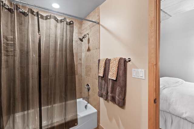 bathroom with shower / bath combination with curtain