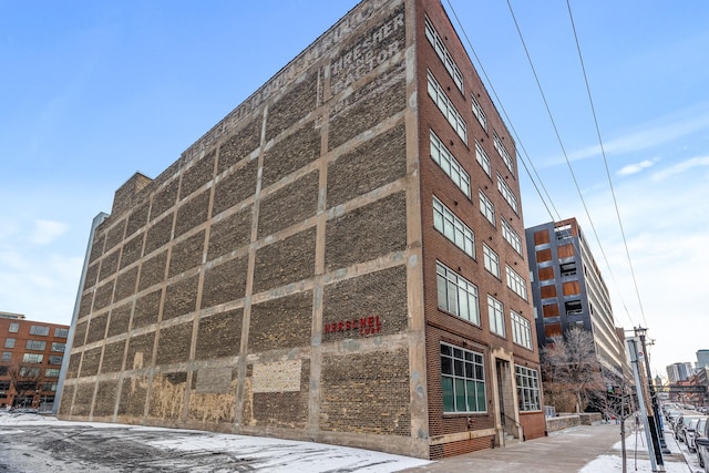 view of building exterior featuring cooling unit