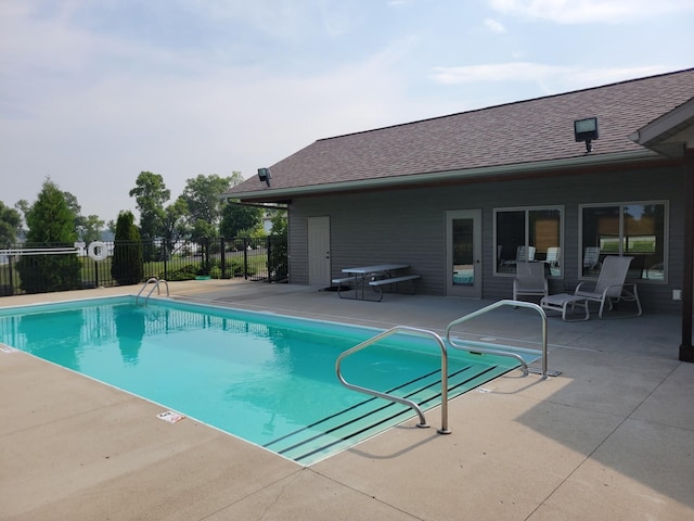 view of pool featuring a patio