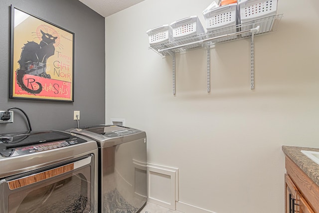 laundry area featuring independent washer and dryer