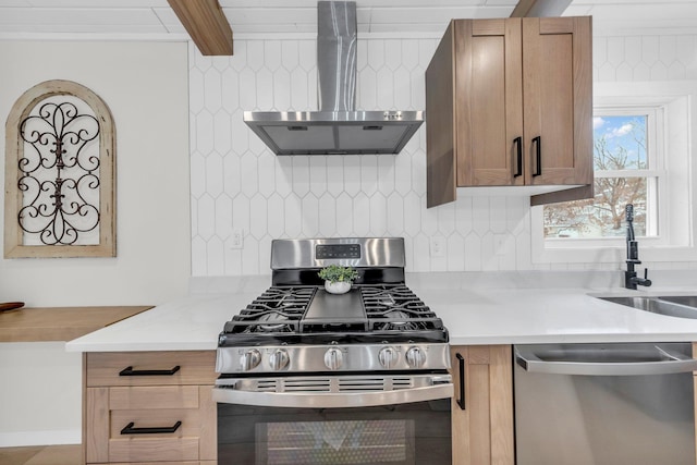 kitchen with appliances with stainless steel finishes, beamed ceiling, sink, decorative backsplash, and wall chimney exhaust hood