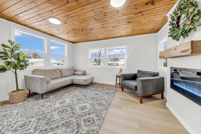 living room with light hardwood / wood-style flooring and wooden ceiling