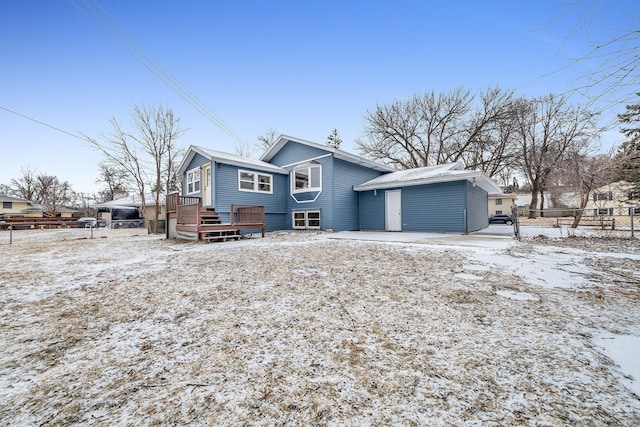 view of front of house with a wooden deck