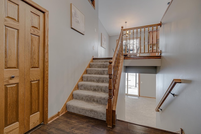 stairs with wood-type flooring